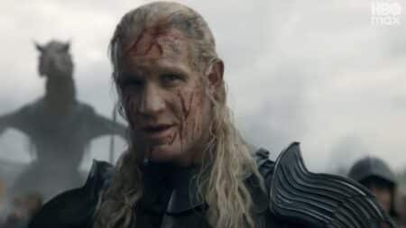 Cena do trailer da temporada 3 de A Casa do Dragão com dragão ao fundo