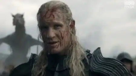 Cena do trailer da temporada 3 de A Casa do Dragão com dragão ao fundo
