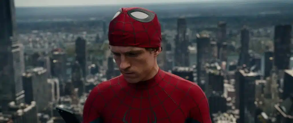 Homem Aranha em cena urbana noturna com vilões Escorpião e Lápide no novo filme