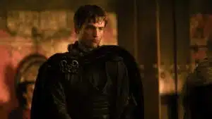 Matt Damon em cena de ação aquática do filme A Odisseia de Christopher Nolan