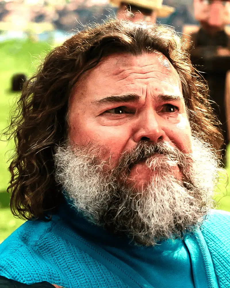 Jack Black como Steve em A Minecraft Movie 2 com visual refinado e expressão misteriosa