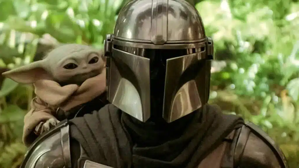 Din Djarin e Grogu em cena de The Mandalorian and Grogu revelando detalhes dos Snowtroopers