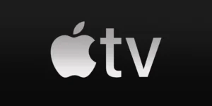 Logo da Apple TV+ com fundo escuro, representando a plataforma de streaming que traz de volta série clássica de Spielberg