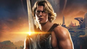 Mestres do Universo acumula US$ 86 milhões com orçamento de US$ 200 milhões e queda de 70% nas bilheterias Cena de ação de filme de fantasia com personagem em traje heroico