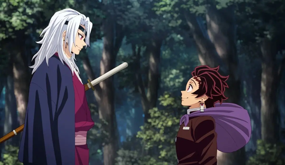Cena de ação de Demon Slayer: Castelo Infinito com Tanjiro e personagens