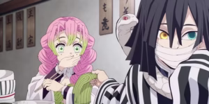 Mitsuri e Obanai em cena do filme Castelo Infinito de Demon Slayer