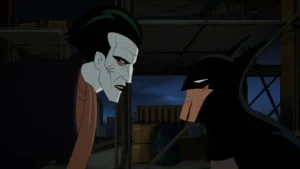 Final da 2ª temporada de Batman: Cruzado Encapuzado explicado: o que acontece com o Coringa? Batman enfrentando o Coringa no clímax da 2ª temporada